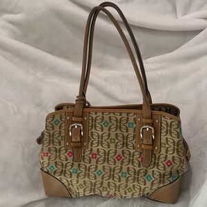 Vintage Fossil tote, beige with printed logo, snap and zipper closure.